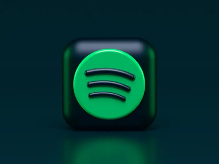 3D green Spotify logo on a dark blue background, symbolizing digital music streaming and Spotify’s sleek tech identity.